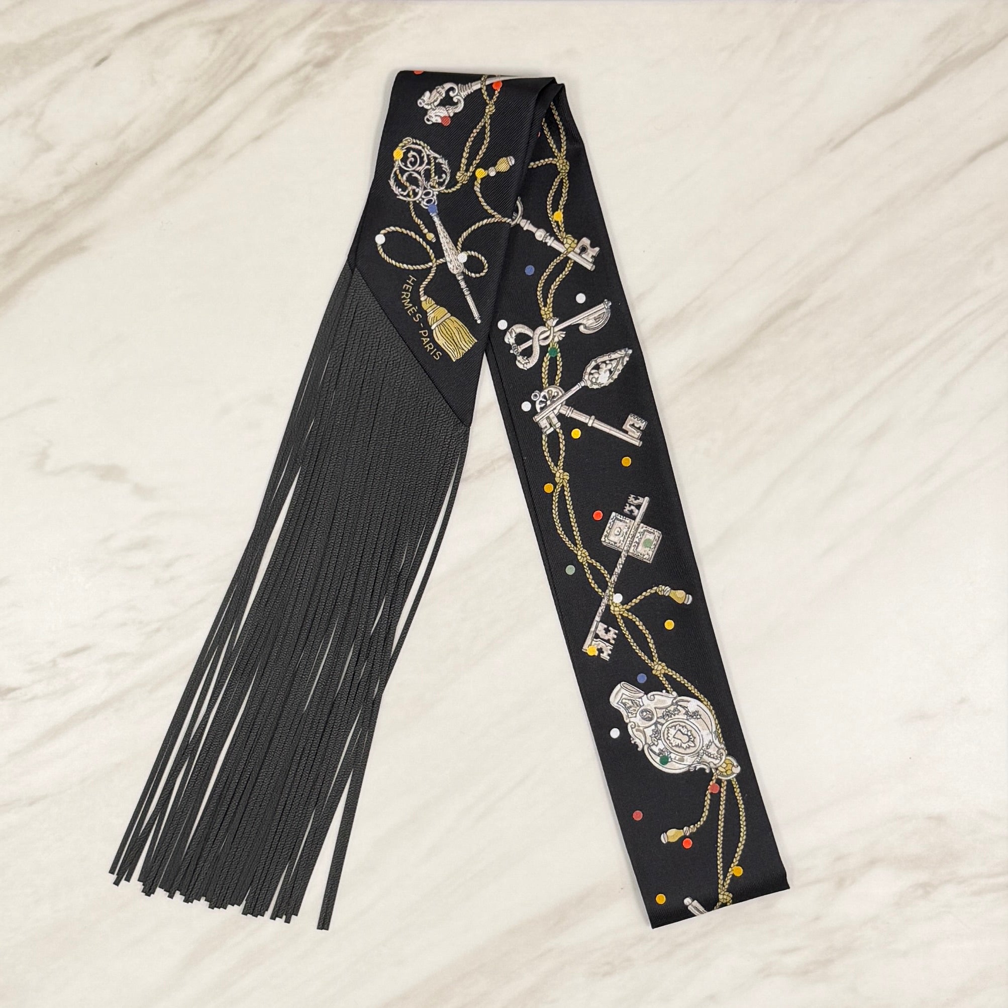 Hermès Les Cles a Pois leather fringes Twilly Leather Fringes Noir - Mordore - Blanc