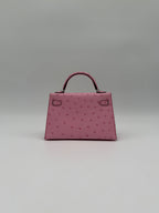 Hermès Mini Kelly Bubblegum Ostrich Palladium Hardware