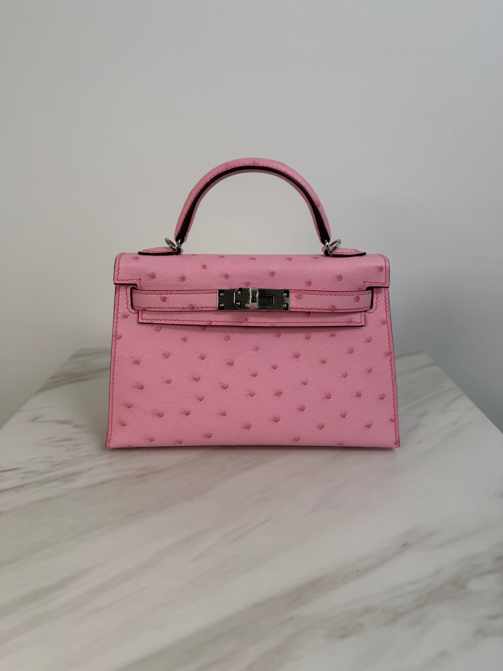 Hermès Mini Kelly Bubblegum Ostrich Palladium Hardware