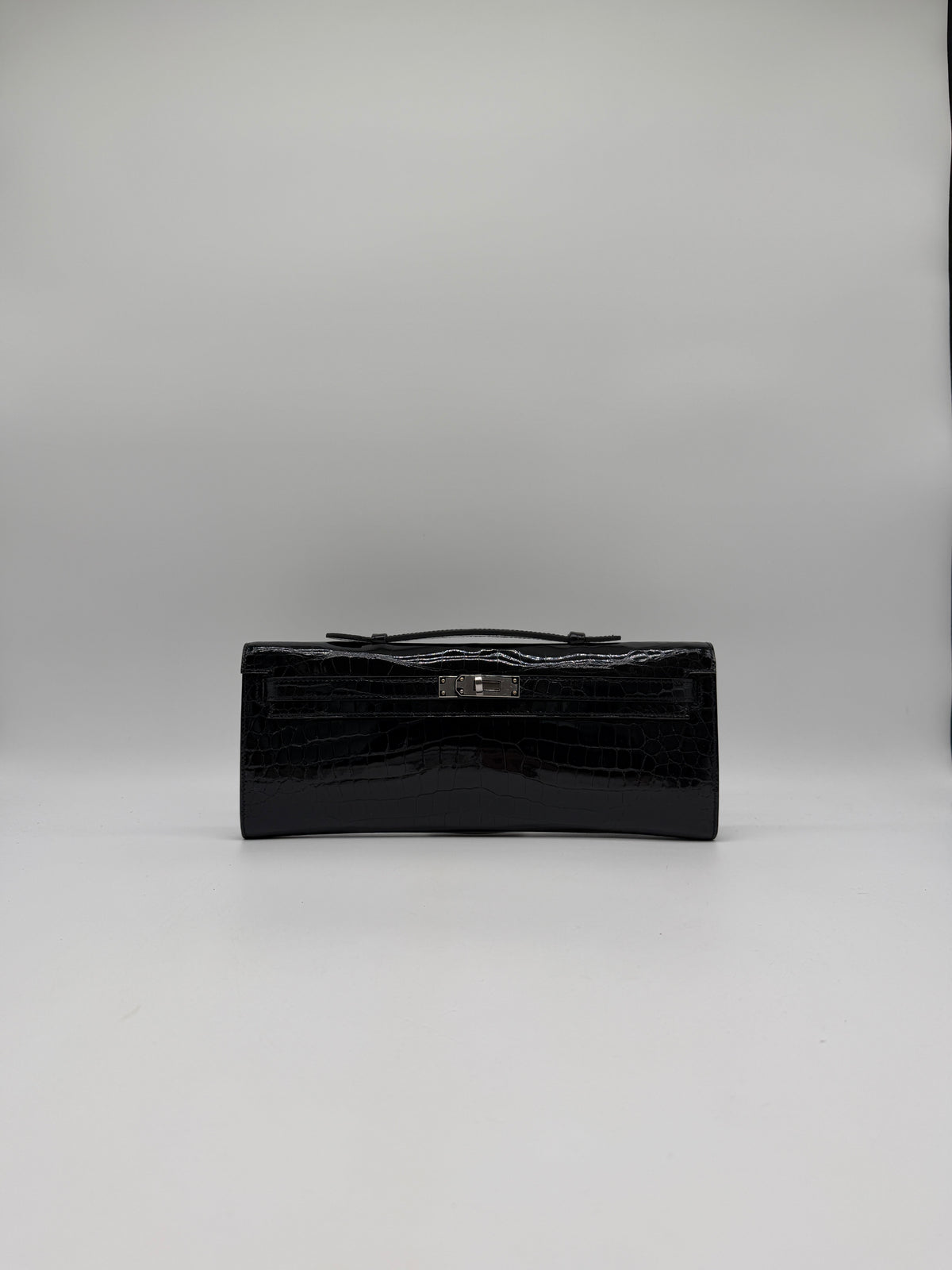Hermès Kelly Cut Black Shiny Porosus Palladium Hardware
