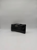 Hermès Kelly Cut Black Shiny Porosus Palladium Hardware