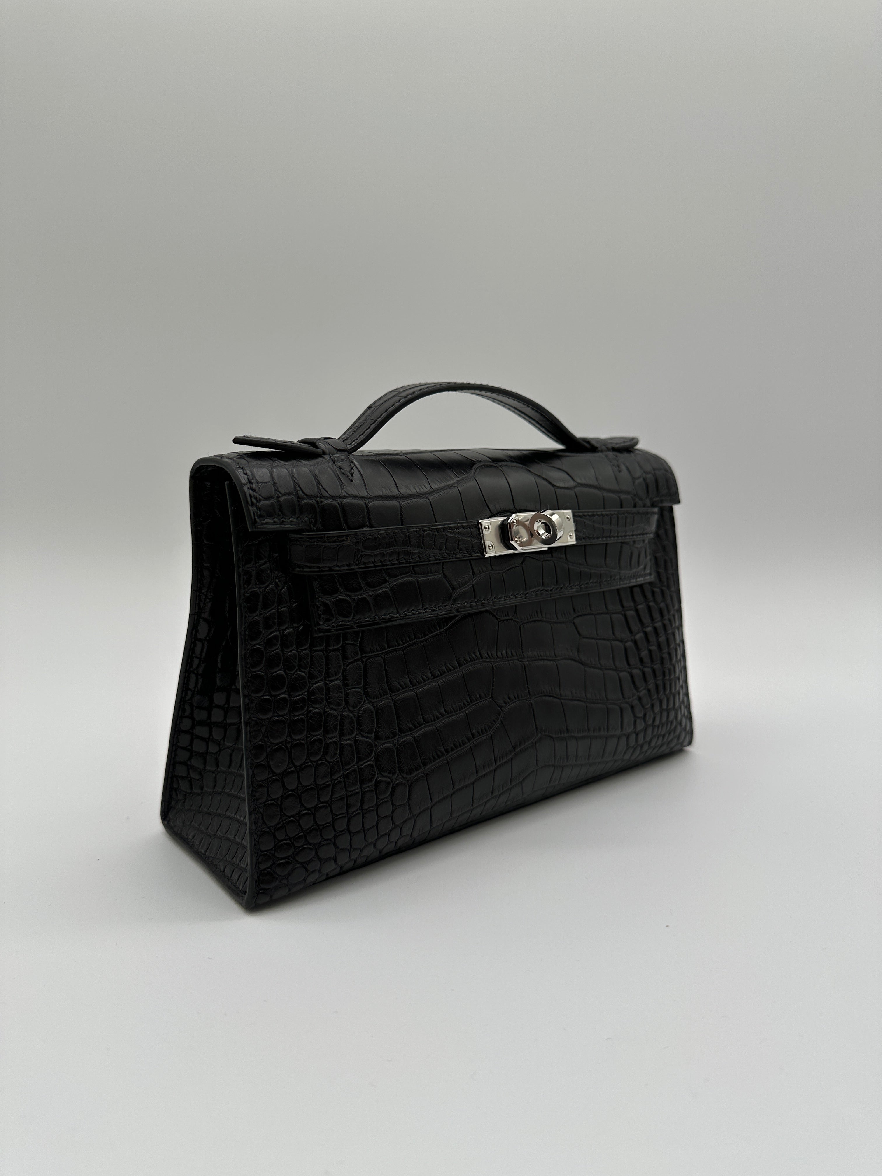 Hermès Kelly Pochette Black Matte Alligator Palladium Hardware
