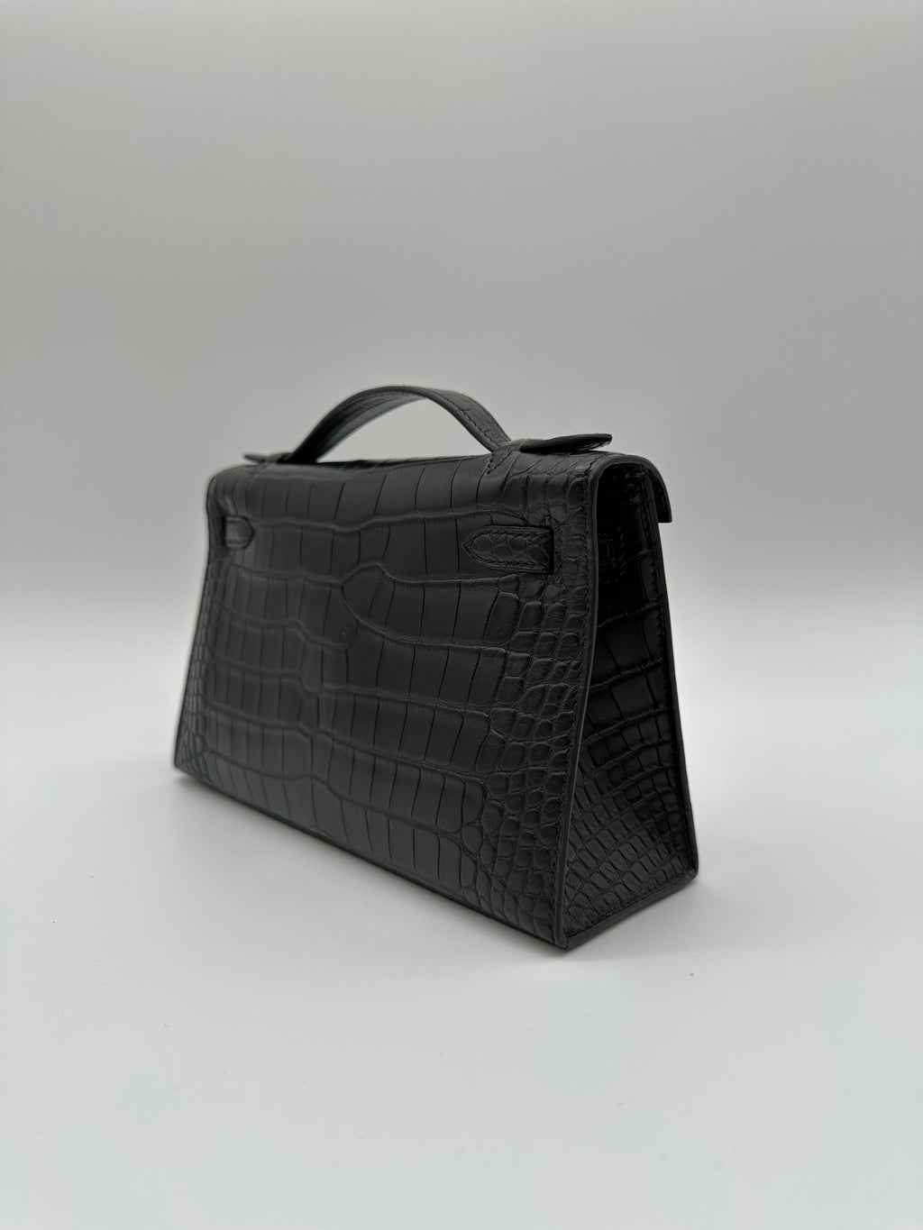 Hermès Kelly Pochette Black Matte Alligator Palladium Hardware