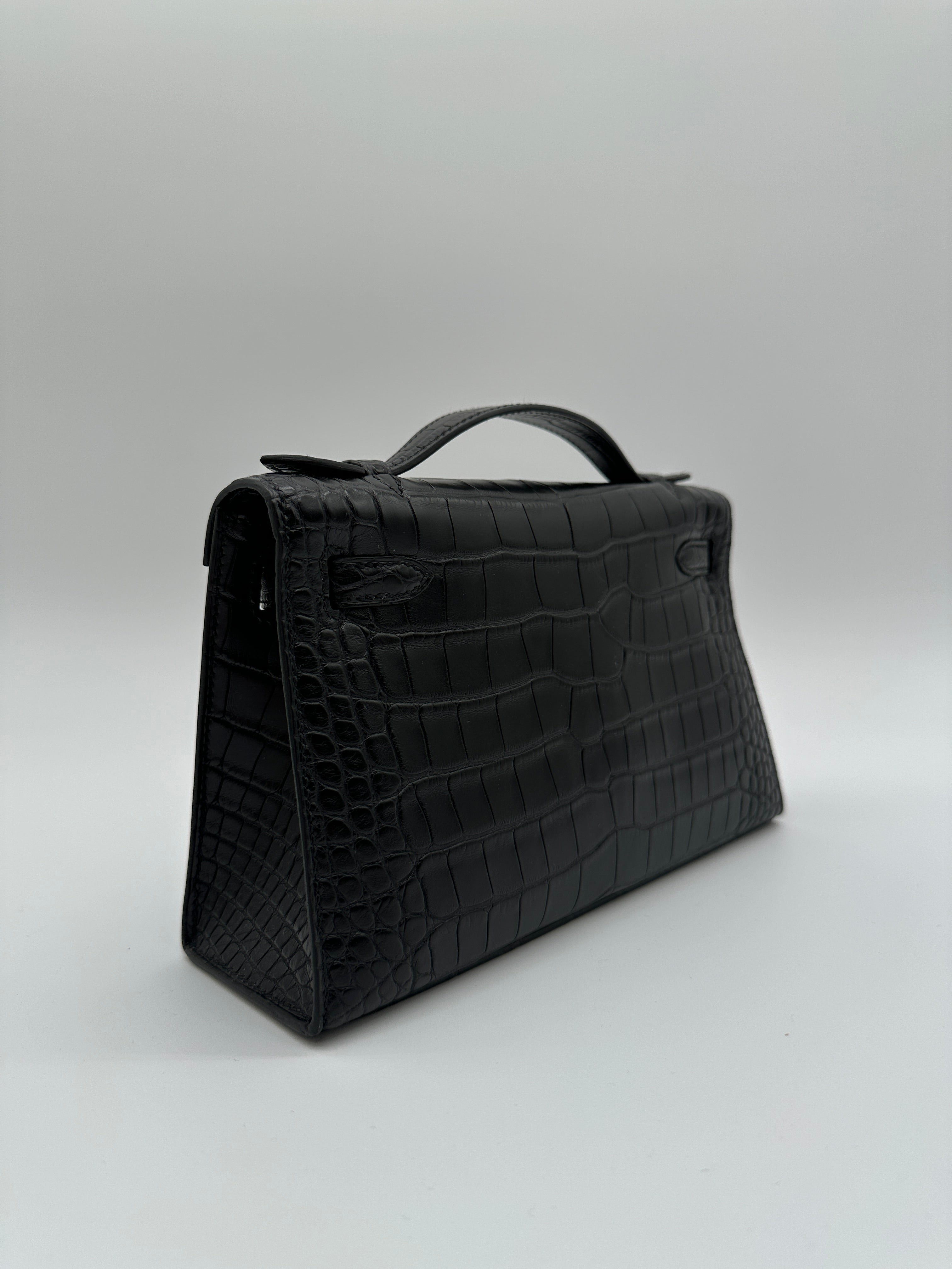 Hermès Kelly Pochette Black Matte Alligator Palladium Hardware