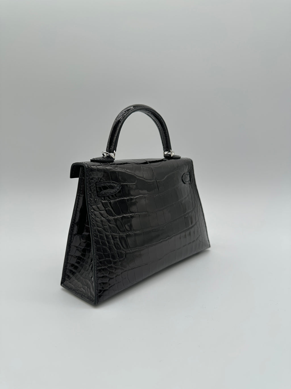 Hermès Mini Kelly Black Shiny Alligator Palladium Hardware
