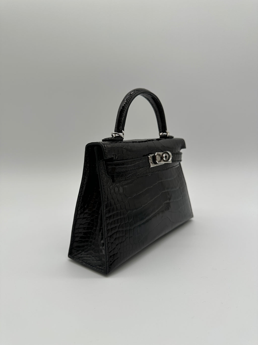 Hermès Mini Kelly Black Shiny Alligator Palladium Hardware