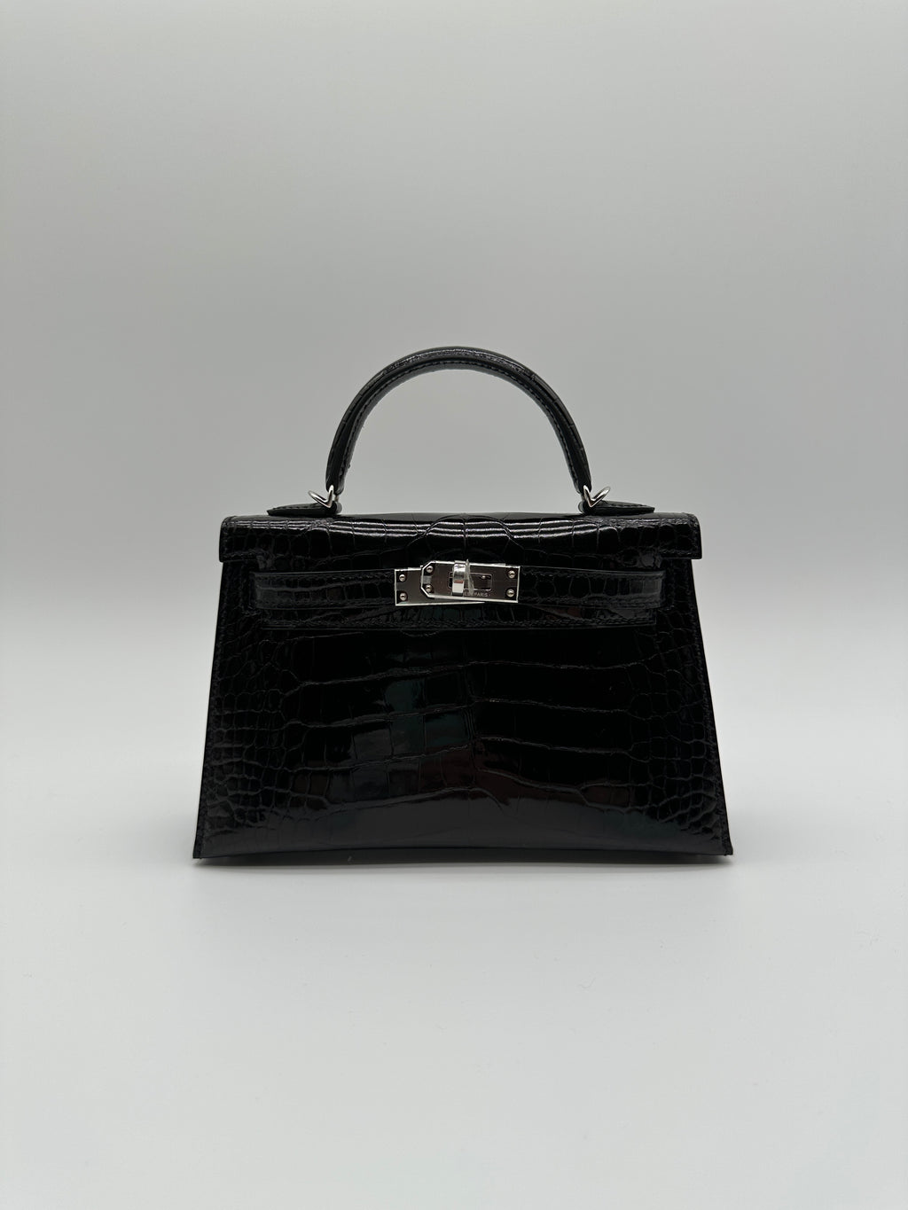 Hermès Mini Kelly Black Shiny Alligator Palladium Hardware
