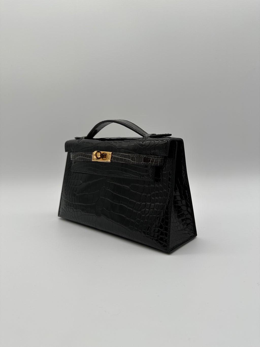 Hermès Kelly Pochette HSS Black/Graphite Shiny Alligator Gold Hardware