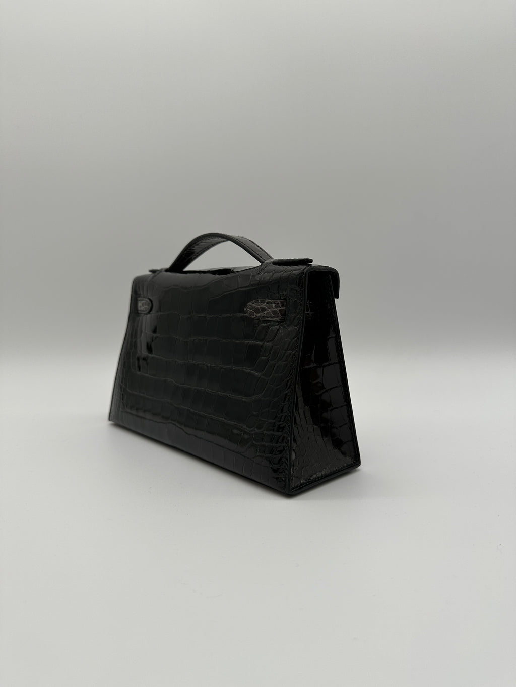 Hermès Kelly Pochette HSS Black/Graphite Shiny Alligator Gold Hardware