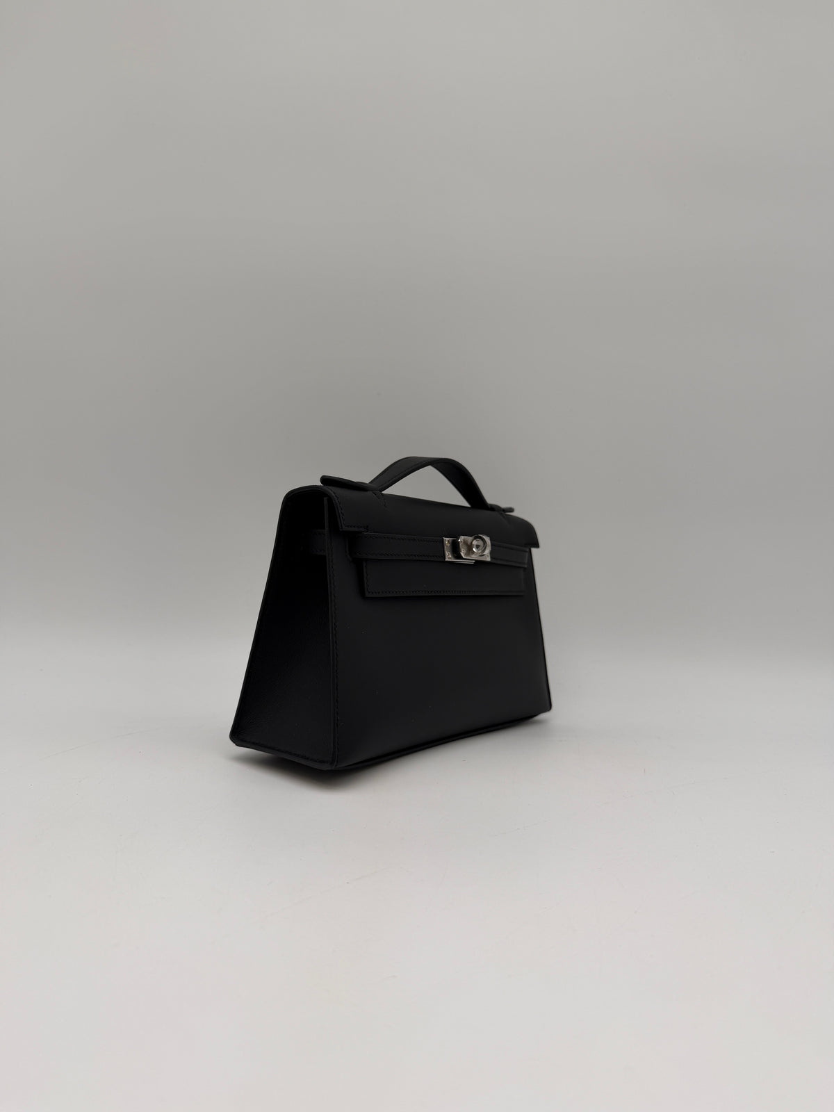 Hermès Kelly Pochette Black Swift Palladium Hardware