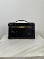 Hermès Kelly Pochette HSS Black/Graphite Shiny Alligator Gold Hardware