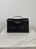 Hermès Kelly Pochette Black Matte Alligator Palladium Hardware