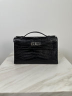 Hermès Kelly Pochette Black Matte Alligator Palladium Hardware